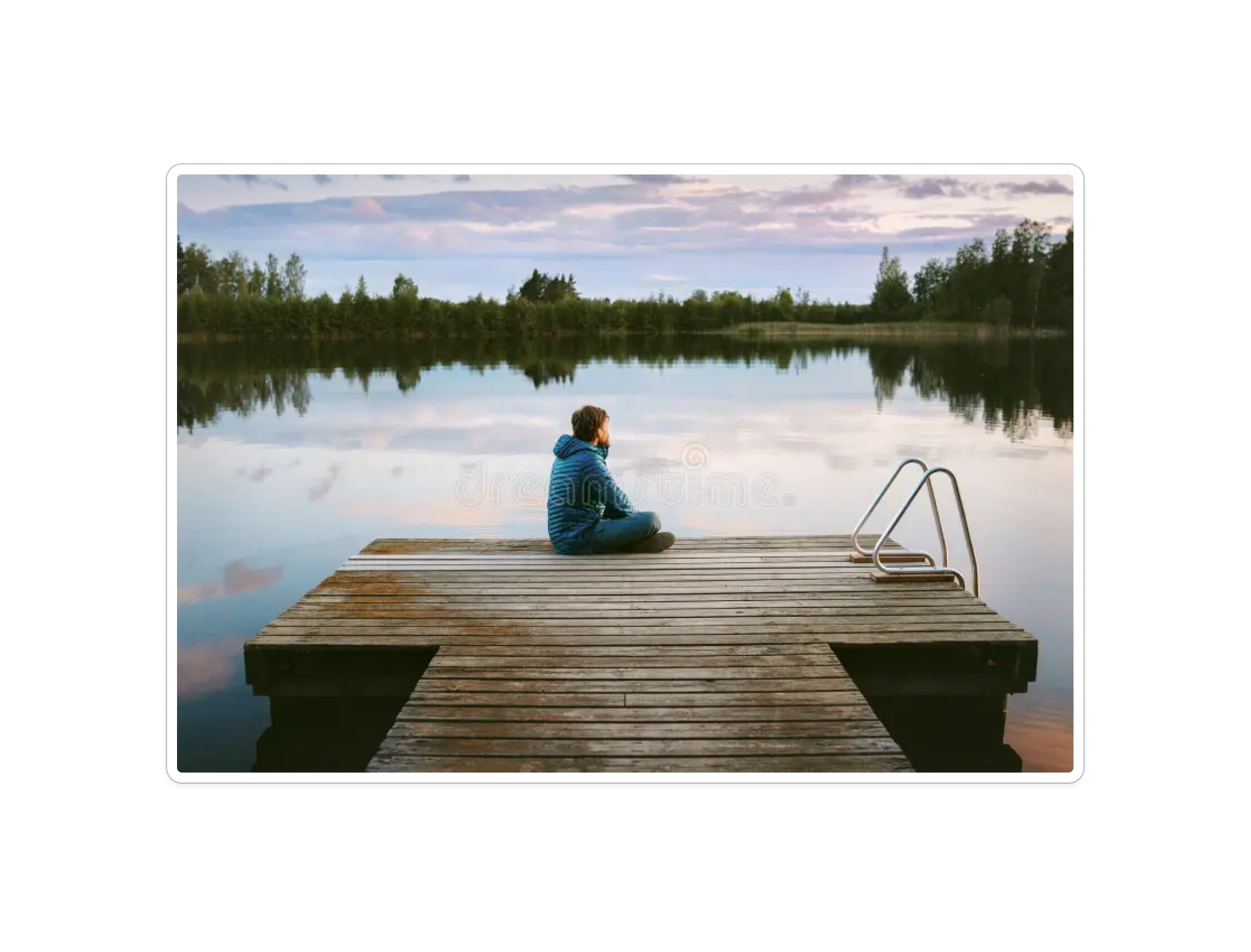 Quiet lakeside dock at dusk